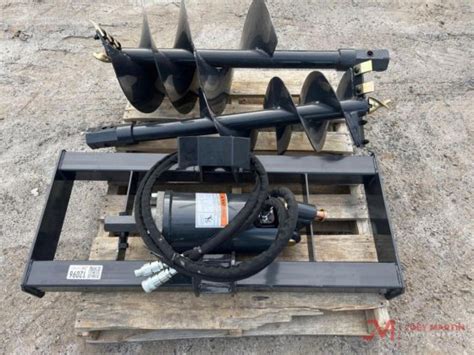 wolverine hydraulic skid steer auger|skid steer tiller wolverine attachment.